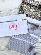 The Mint™ Seersucker Cosmetic Pouch