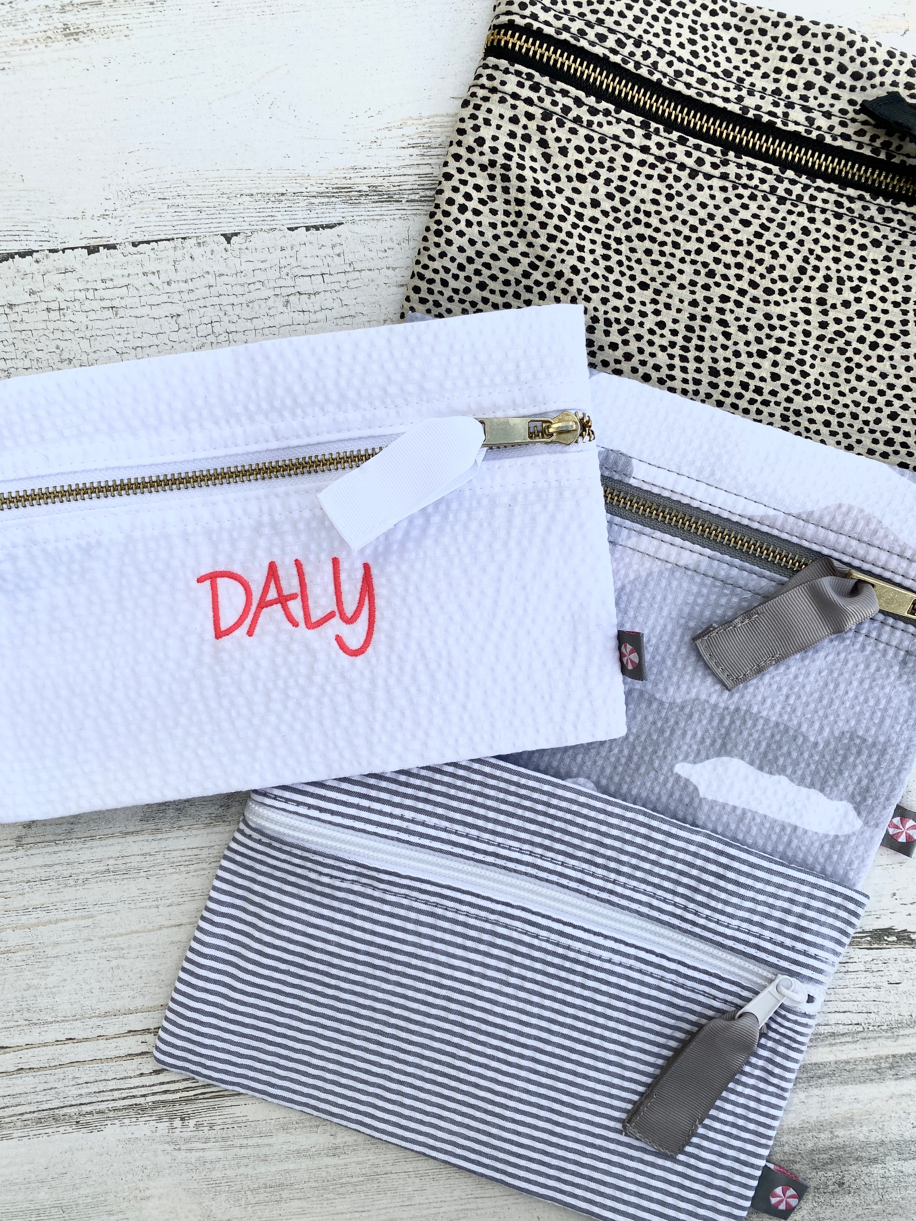 The Mint™ Seersucker Cosmetic Pouch