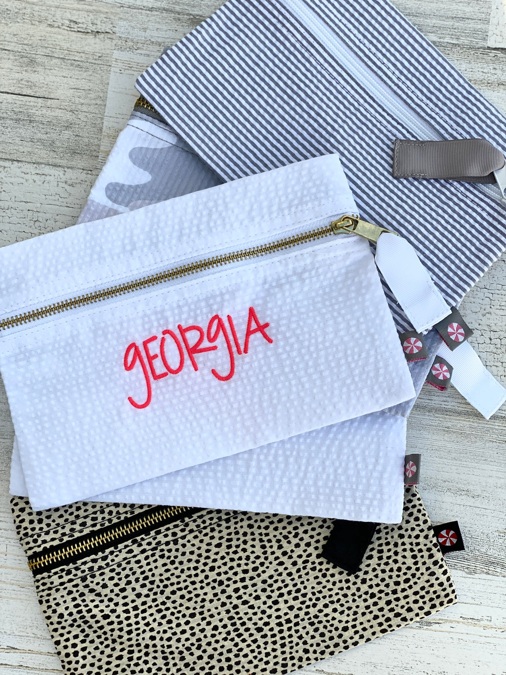 The Mint™ Seersucker Cosmetic Pouch